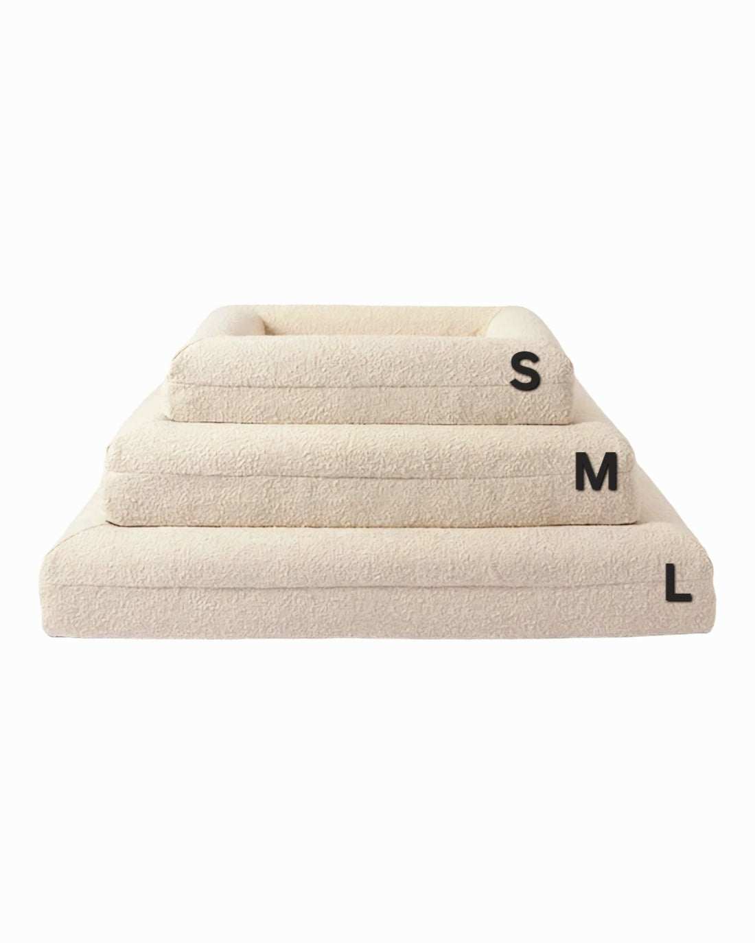 Stacked beige Hundebett Barklay S dog beds with washable boucle cover in sizes small, medium, and large.