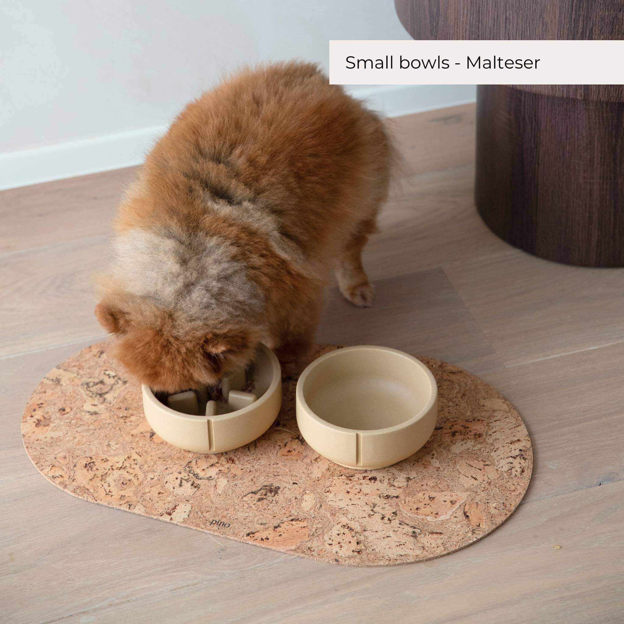 Sustainable sand bowls, hand-crafted, durable feeding bowls on wooden mat.