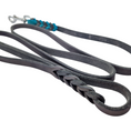 Bild in Galerie-Betrachter laden, Dog leash made of soft leather with hand loop and braided elements.
