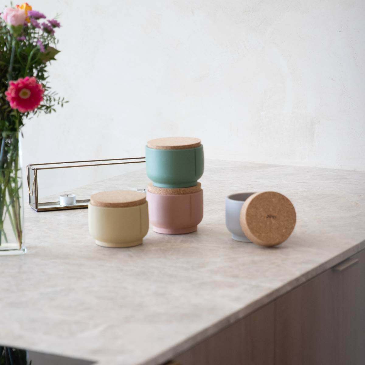 Leckerlie Dose with airtight cork closure for fresh pet snacks on a countertop.